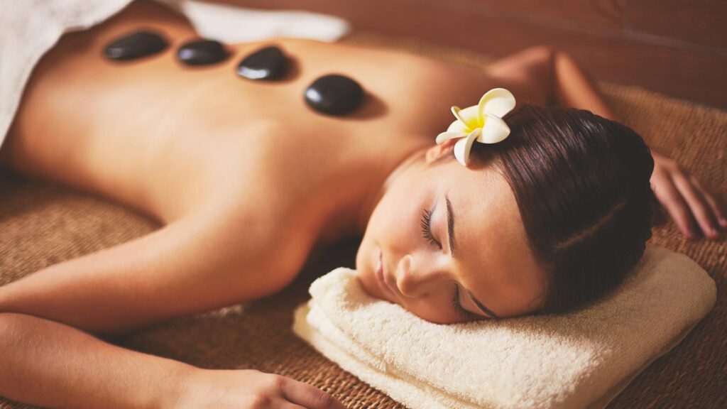 massage therapist in Parktown North giving full-body massage